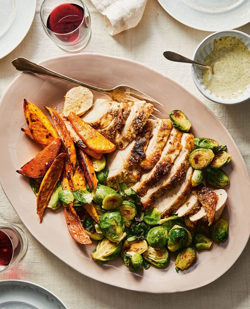 Sheet Pan Thanksgiving with Roast Turkey Breast, Maple-Glazed Sweet Potatoes, and Brussels Sprouts. Reprinted from "Dinner in One." Copyright © 2022 by Melissa Clark. Photographs copyright © 2022 by Linda Xiao. Published by Clarkson Potter, an imprint of Random House.