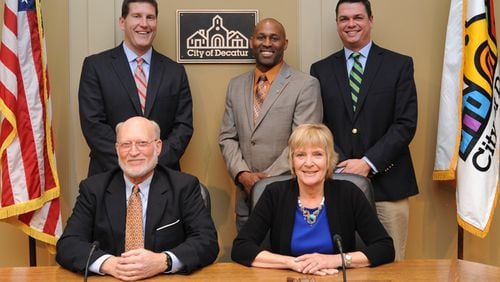 Decatur’s commission is one step removed from getting its first raise in 23 years. Back row L-R: Brian Smith, Tony Powers and Scott Drake. Front row: Mayor Pro Tem Fred Boykin, and Mayor Patti Garrett. Courtesy City of Decatur.