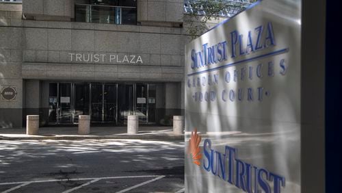 A SunTrust Plaza sign is one of a few still displayed at the newly named Truist Plaza, located at 303 Peachtree Street, in downtown Atlanta, Monday, October 11, 2021.  (Alyssa Pointer/ Alyssa.Pointer@ajc.com)