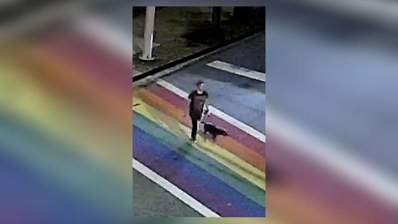 Atlanta police have released this surveillance image of the homicide victim and her dog. Anyone with information is asked to contact Crime Stoppers Atlanta.