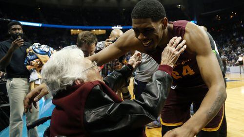 Mar 22, 2018; Atlanta, GA, USA; Loyola Ramblers forward Aundre Jackson (24) hugs Sister Jean Dolores-Schmidt after defeating the Nevada Wolf Pack in the semifinals of the South regional of the 2018 NCAA Tournament at Philips Arena. Mandatory Credit: Brett Davis-USA TODAY Sports ORG XMIT: USATSI-378335 ORIG FILE ID: 20180322_ajw_ad1_142.jpg