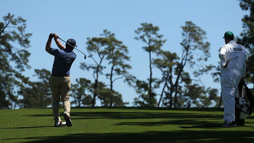 Two time Masters champion Tom Watson, who is playing in his final Masters, hits his fairway shot to the 17th green during the first practice round at Augusta National Golf Club on Monday, April 4, 2016, in Augusta. Watson won the tournament in 1977 and 1981. Curtis Compton / ccompton@ajc.com