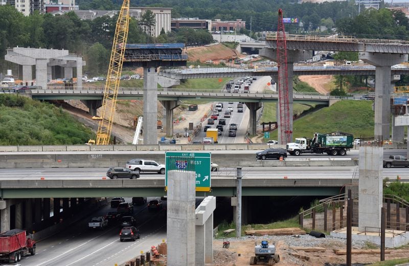 One of metro Atlanta’s worst traffic bottlenecks — the junction of I-285 and Ga. 400 — is now a massive construction zone. The Georgia Department of Transportation is spending $800 million to rebuild the interchange. (Hyosub Shin / Hyosub.Shin@ajc.com)