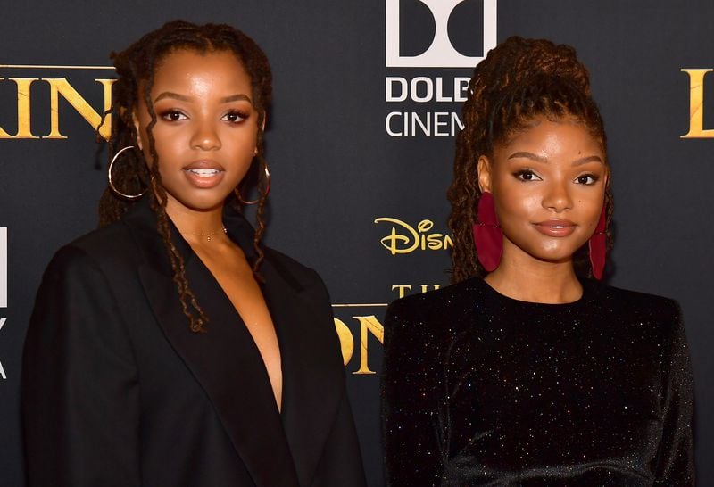 Chloe Bailey and Halle Bailey (right), known as the singing duo Chloe x Halle, attend the premiere of Disney’s “The Lion King” at Dolby Theatre on July 9, 2019, in Hollywood, Calif. MATT WINKELMEYER / GETTY IMAGES
