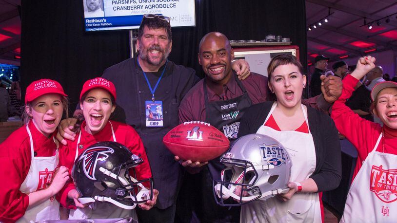 Atlanta restaurateur Kevin Rathbun (third from left) and former Atlanta Falcons player Chris Draft participate in a Taste of the NFL event held in Houston in conjunction with the 2017 Super Bowl. Rathbun and Draft have been involved with the Taste of the NFL nonprofit for years, serving as the Atlanta Falcons chef representative and player representative, respectively. CONTRIBUTED BY TOM DONOHUE