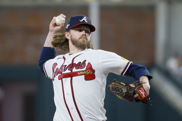 Atlanta Braves relief pitcher Pierce Johnson (38) delivers to the Philadelphia Phillies during the seventh inning of NLDS Game 2 in Atlanta on Monday, Oct. 9, 2023.   (Miguel Martinez / Miguel.Martinezjimenez@ajc.com)