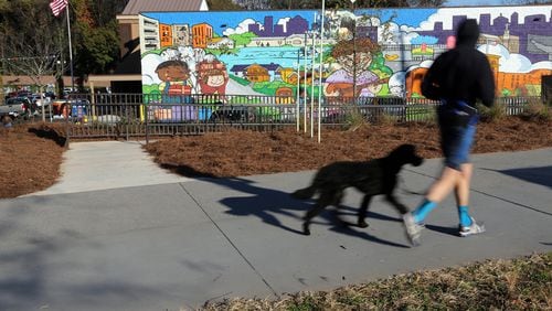 The Kroger on Ponce De Leon Avenue, nicknamed ‘Murder Kroger’, recently added a mural, an access ramp to the Beltline, bike racks and a bicycle repair station. A Kroger spokesman said they would prefer to be known as ‘Beltline Kroger.’ BEN GRAY / BGRAY@AJC.COM