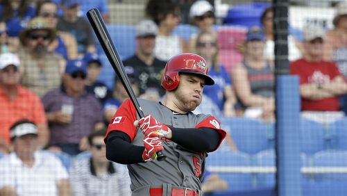Canada's Freddie Freeman drives in a run on a base hit in the first inning during an exhibition baseball game against the Toronto Blue Jays, Tuesday, March 7, 2017, in Dunedin, Fla. (AP Photo/John Raoux)