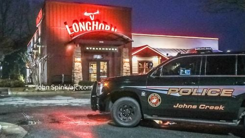 Johns Creek police requested the assistance of North Metro SWAT after confronting a burglary suspect at a LongHorn Steakhouse on Medlock Bridge Road.