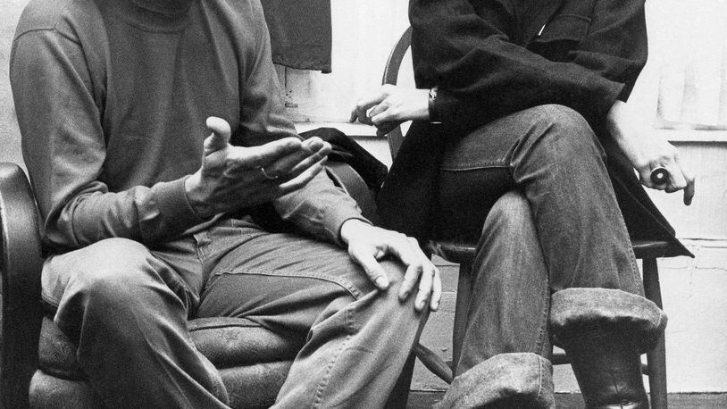 FILE - In this Dec. 26, 1972 file photo, actress Jane Fonda, right, and Tom Hayden, one of the founders of SDS, talk at the home of a friend in London, after their arrival from Paris. Hayden, the famed 1960s anti-war activist who moved beyond his notoriety as a Chicago 8 defendant to become a California legislator, author and lecturer, has died at age 76. His wife, Barbara Williams, says Hayden died on Sunday, Oct. 23, 2016, in Santa Monica of a long illness. (AP Photo, File)