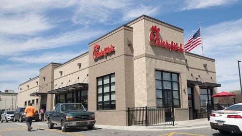 Chick-fil-A relied heavily on drive-thrus even before the pandemic, but they picked up much more of the load when dining rooms shuttered amid the rise of COVID-19. The Atlanta-based chain had been pushing for all of its franchisees' dining spaces to open this month. But that deadline has now been pushed back. (ALYSSA POINTER/ALYSSA.POINTER@AJC.COM)