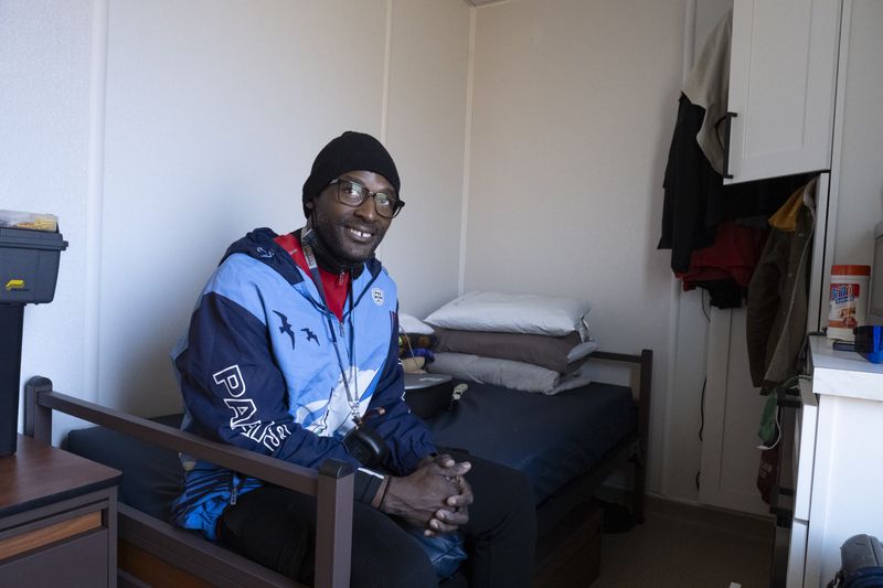 Keith Taylor sits in his home at The Melody, a 40-unit transitional housing development in Atlanta on Wednesday, Feb. 14, 2024.   (Ben Gray / Ben@BenGray.com)