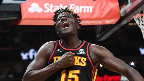 Hawks center Clint Capela reacts after dunking the ball against the Hornets on Wednesday night. Capela and his teammates will try to earn the No. 8 seed in the Eastern Conference playoffs with a win Friday at Cleveland. (Hyosub Shin / Hyosub.Shin@ajc.com)