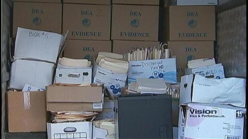 Federal agents raided three Atlanta Medical and Research Clinics in 2013, seizing a truckload of potential evidence from one office. Drs. Nevorn Askari and William Richardson, along with the pain clinic owners, were later indicted for their roles in the pill mills. Credit: Channel 2 Action News
