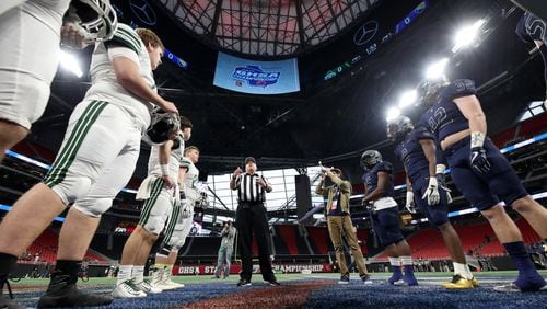 Eagle's Landing Christian and Athens Academy met for the coin toss prior to Friday's Class A private title game at Mercedes-Benz Stadium. Two of Friday's games and all four of Saturday's games were postponed because of winter weather.