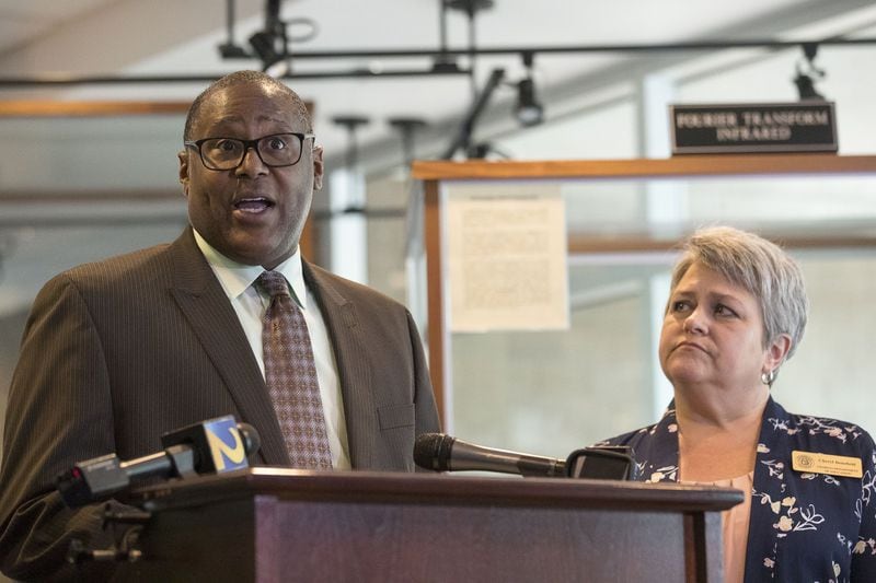 07/18/2018 — Atlanta, Georgia — Walker Tisdale (left), Director of Suicide Prevention at Georgia Department of Behavioral Health and Developmental Disabilities, speaks during a press conference held at the GBI headquarters in Decatur, Wednesday July 18, 2018. The press conference was held to introduce a public service announcement aimed at advising parents on how they can work to help prevent youth suicides in Georgia. (ALYSSA POINTER/ALYSSA.POINTER@AJC.COM)