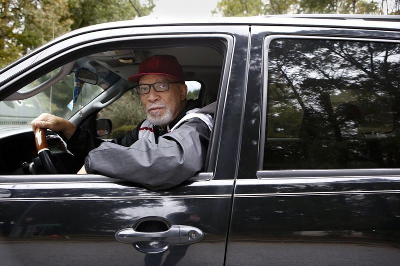 Pete Berry, 70, poses for a portrait in his car near the front of the Loch Lomond Estates neighborhood in South Fulton. Berry, who says he has lived in Loch Lomond Estates since 1985 and served as its president in the early 1990s, says that he is in support of the neighborhood being part of Atlanta largely because of tax concerns. (Casey Sykes for The Atlanta Journal-Constitution)