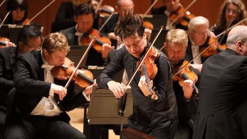 Violinist Joshua Bell performed Tchaikovsky’s Violin Concerto in D Major with the Atlanta Symphony Orchestra and its music director Robert Spano on Sept. 15, ushering in the new 2016-17 season. CONTRIBUTED BY JEFF ROFFMAN