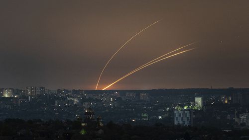 Russian rockets are launched against Ukraine from Russia's Belgorod region, seen from Kharkiv, Ukraine, on Thursday, April 18, 2024. (AP Photo/Evgeniy Maloletka)