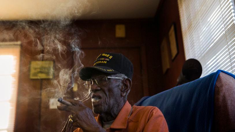 Richard Overton, the nation’s oldest World War II veteran, lives in East Austin where he spends his days sweeping pecans off of his front porch, smoking cigars, and enjoying the perks of being a celebrity. Reshma Kirpalani / AMERICAN-STATESMAN