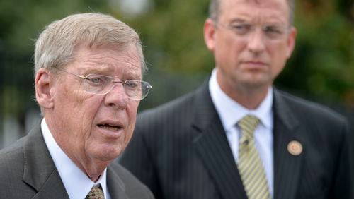 U.S. Senator Johnny Isakson, R-Ga., left, and Rep. Doug Collins, R-Ga., hold a press conference outside the Charlie Norwood VA Medical Center in Augusta, Ga., Tuesday, Aug. 19, 2014. Isakson is a member of the Senate Veterans Affairs Committee and was in Augusta to meet with local VA officials and hosted a town hall meeting with local veterans. (AP Photo/The Augusta Chronicle, Michael Holahan) U.S. Senator Johnny Isakson, R-Ga., left, and U.S. Rep. Doug Collins, R-Ga., at a press conference last year in Augusta. (AP/Augusta Chronicle, Michael Holahan).