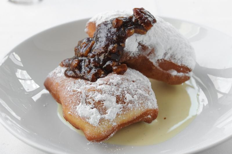 Sour Dough Beignets with pecan pie filling, bourbon anglaise. (BECKY STEIN PHOTOGRAPHY)