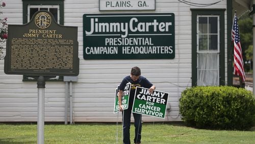 Residents of Plains, Ga., posted hundreds of campaign-like signs in support of their most famous citizen.