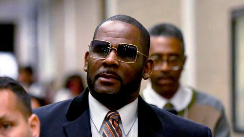 FILE - R. Kelly leaves the Daley Center after a hearing in his child support case May 8, 2019, in Chicago. A federal appeals court on Friday, April 26, 2024, upheld R&B singer R. Kelly’s sex-crime conviction and 20-year sentence in his Chicago case. (AP Photo/Matt Marton, File)