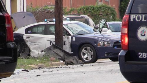 A Columbus police car was damaged in a chase after which a murder suspect died. (Credit: Columbus Ledger-Enquirer)