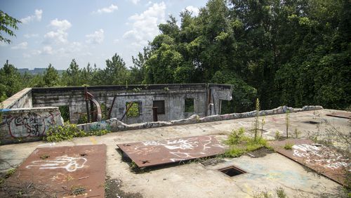 Old buildings including the old Atlanta prison farm are scattered throughout the site for the proposed training center off Key Road. (Alyssa Pointer/Atlanta Journal Constitution)