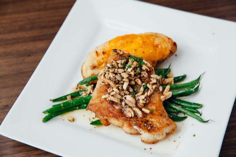 Day Boat Gulf Grouper Almandine with toasted almonds and brown butter, twice baked potato and haricots verts. Credit: Justen Clay.