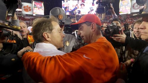 Alabama coach Nick Saban congratulates Clemson coach Dabo Swinney after the Tigers beat the Crimson Tide 35-31 in the College Football Playoff championship game at Raymond James Stadium on Jan. 9, 2017 in Tampa, Fla. (Photo by Streeter Lecka/Getty Images)