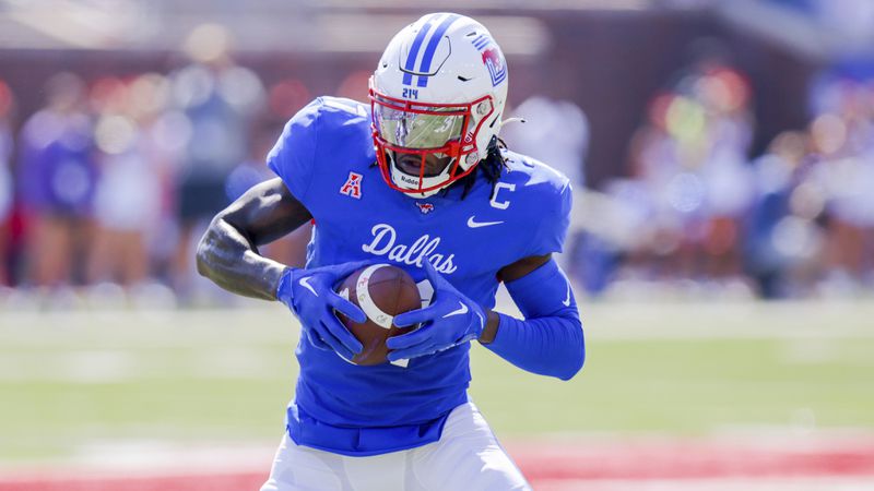 SMU wide receiver Rashee Rice looks to run after catching a pass during the first half of an NCAA college game against TCU on Saturday, Sept. 24, 2022, in Dallas, Texas. (AP Photo/Gareth Patterson)