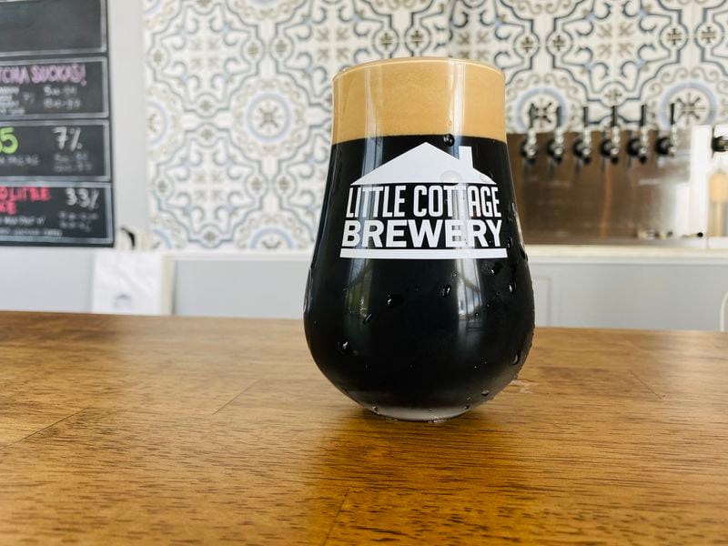 Two Little Mice is the signature low-alcohol coffee milk stout at Little Cottage Brewery in Avondale Estates. (Bob Townsend for The Atlanta Journal-Constitution)