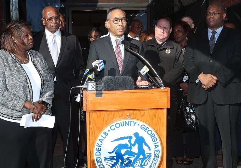DeKalb County CEO Burrell Ellis, backed by county officials, holds a press conference before his term ends on Dec. 29. CURTIS COMPTON / CCOMPTON@AJC.COM