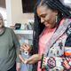 Air Force Veteran Rhonda Lawson (right) shows off a piece of jewelry she made with the help of her instructor, Priscilla Fritsch (left), at Callanwolde Fine Arts Center. Lawson credits these classes with saving her life.  PHIL SKINNER FOR THE ATLANTA JOURNAL-CONSTITUTION