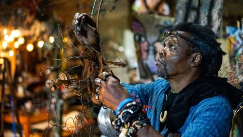 Lonnie Holley, working in his studio in 2018, is the subject of a new documentary by Atlanta filmmaker George King, ”Thumbs Up for Mother Universe: Stories from the Life of Lonnie Holley.”