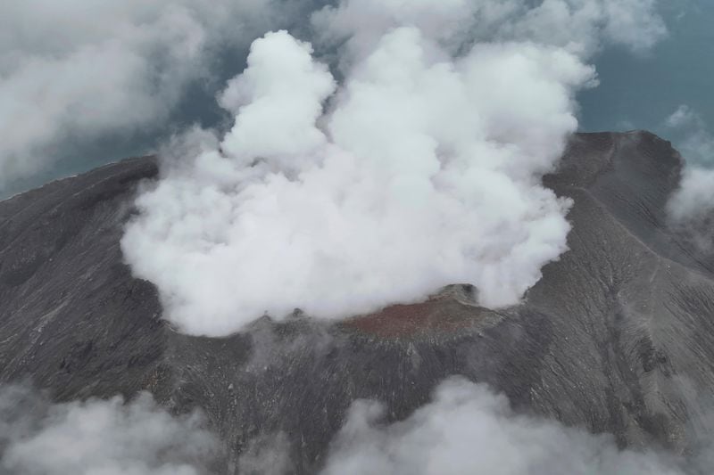 This photo released by the Indonesian National Search and Rescue Agency (BASARNAS) shows Mount Ruang spewing smoke in the Sulawesi island, Indonesia, Friday, April 19, 2024. More people living near the erupting volcano were evacuated on Friday due to the dangers of spreading ash, falling rocks, hot volcanic clouds and the possibility of a tsunami. (National Search and Rescue Agency via AP)