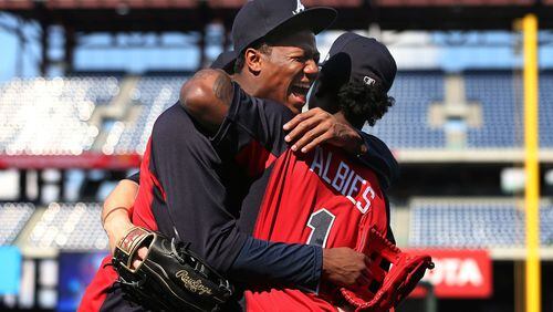 “We’re tight with each other like brothers,’’ Ozzie Albies, right, says of his 20-year-old teammate Ronald Acuña Jr.