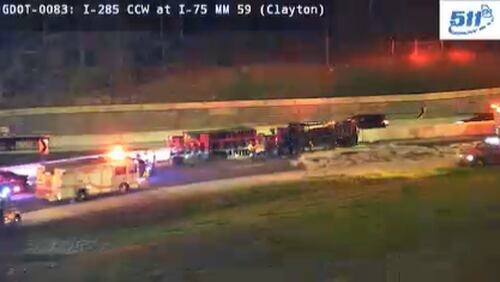 An overturned big rig blocked the westbound ramp to I-285 from I-75 North early Wednesday in Clayton County.