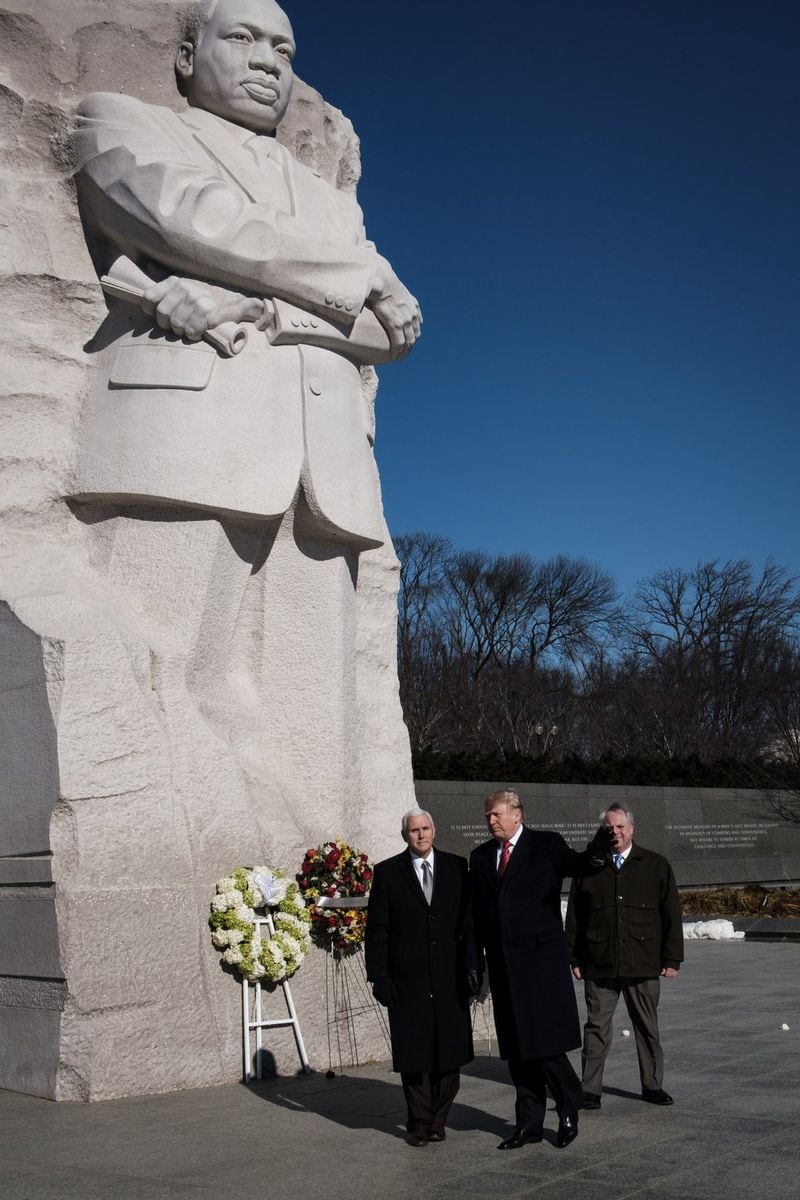 WASHINGTON, DC: President Donald Trump and Vice President Mike Pence visit the Martin Luther King Jr. Memorial on January 21, 2019 in Washington, DC. They placed a wreath to commemorate the slain civil rights leader. (Photo by Pete Marovich/Getty Images)