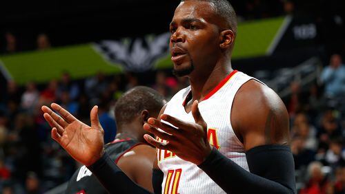 ATLANTA, GA - FEBRUARY 19: Paul Millsap #4 of the Atlanta Hawks reacts after being charged with a foul against the Miami Heat at Philips Arena on February 19, 2016 in Atlanta, Georgia. NOTE TO USER User expressly acknowledges and agrees that, by downloading and or using this photograph, user is consenting to the terms and conditions of the Getty Images License Agreement. (Photo by Kevin C. Cox/Getty Images)