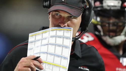 Falcons head coach Dan Quinn calls a defense against the Washington Redskins.  Curtis Compton/ccompton@ajc.com