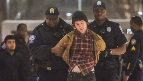 Cole Rainey-Slavick, a student at Bard College, was one of eight protesters arrested Tuesday. JOHN SPINK/ JSPINK@AJC.COM
