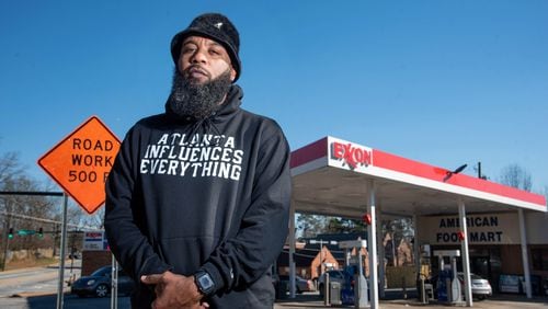 February 24, 2021 Atlanta - Portrait of Brian Page outside the Exxon gas station in his Southwest DeKalb neighborhood on Wednesday, February 24, 2021. Page launched a protest and boycott of the Exxon gas station in his Southwest DeKalb neighborhood, after a clerk told one customer he "didn't give a f--- about the black community" and the owner called him a "food stamp cockroach." They protested outside the store for 66 days -- and it worked. The owner agreed to sell. (Hyosub Shin / Hyosub.Shin@ajc.com)