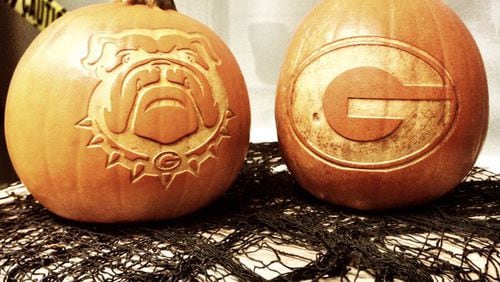 The MakerSpace lab at the University of Georgia's science library carved these Dawg-themed pumpkins ahead of Halloween this year. Photo by @UGAAthletics on Twitter.