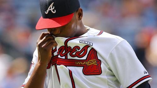 Braves starter Julio Teheran reacts after giving up a three-run triple to Ben Revere on Monday. (Curtis Compton photo/AJC)