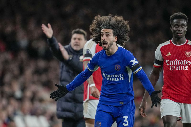 Chelsea's Marc Cucurella, center, reacts during the English Premier League soccer match between Arsenal and Chelsea at Emirates Stadium in London, Tuesday, April 23, 2024. (AP Photo/Kin Cheung)
