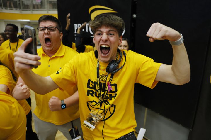 Kennesaw State students react after the Owls beat the Liberty Flames 88-81 at the Kennesaw State Convention Center on Thursday, Feb 16, 2023.
 Miguel Martinez / miguel.martinezjimenez@ajc.com