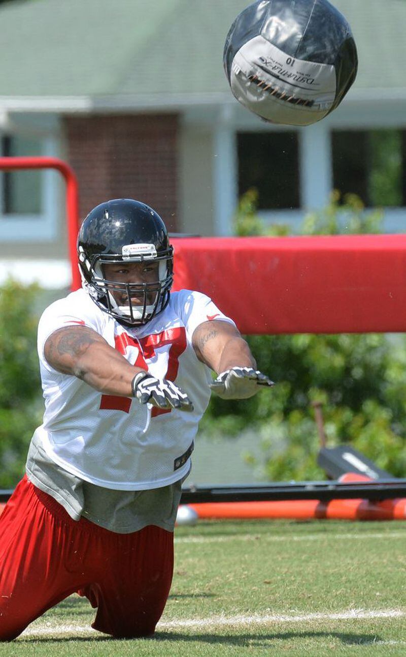 HYOSUB SHIN / AJC May 16, 2014 Flowery Branch - Atlanta Falcons rookie defensive end Ra'Shede Hageman #77 during the first day of Mini-Camp for rookies on Friday, May 16, 2014. HYOSUB SHIN / HSHIN@AJC.COM